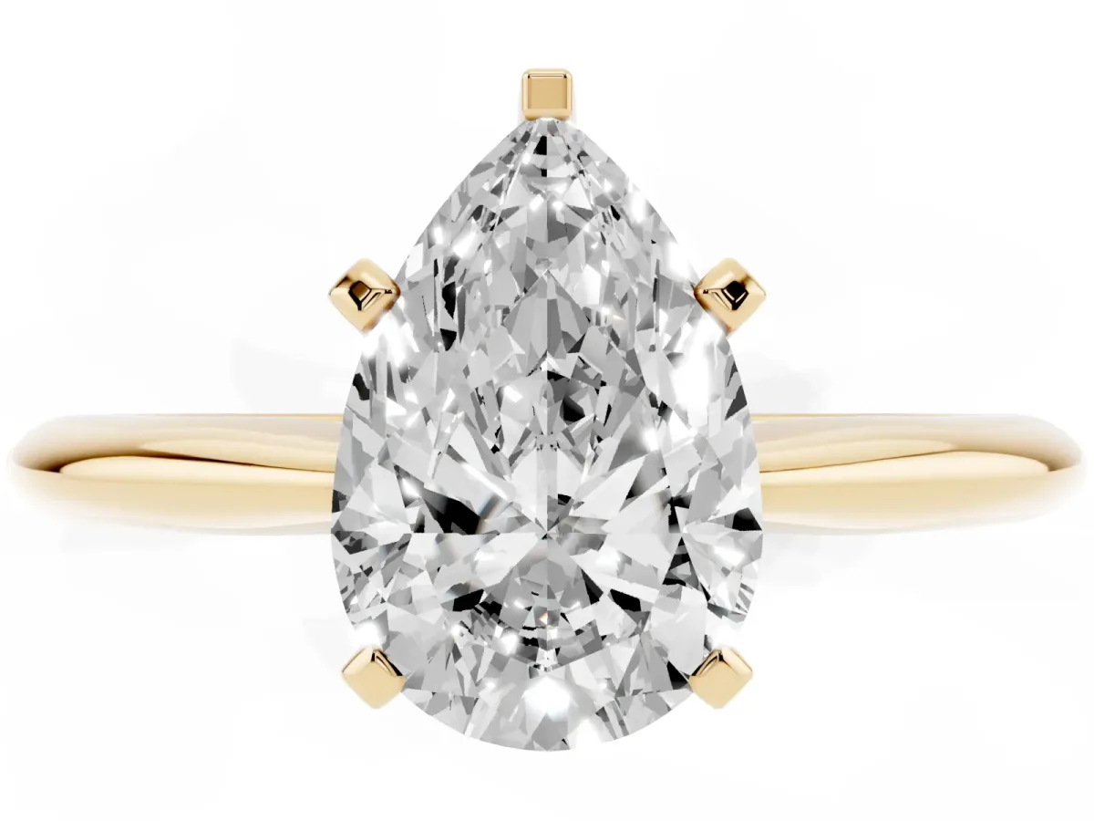 Pear Cut Cut Solitaire Ring with Four-Prong Setting on a Classic Band Yellow gold