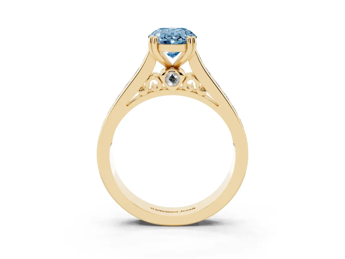 Fancy Blue Oval Cut Cut Channel Set Solitaire Engagement Ring with Prong Setting Yellow gold