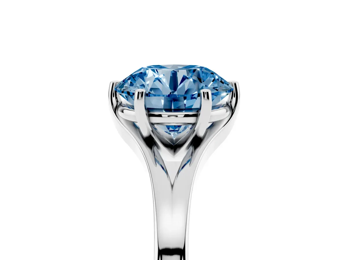 Fancy Blue Round Cut Solitaire Diamond Ring with Six-Prong Setting and Tapered Band Silver