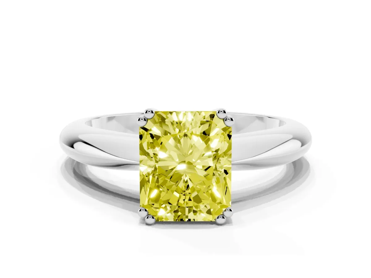 Fancy Yellow Radiant Cut Cut Solitaire Engagement Ring with Tapered Band and Four-Prong Setting White gold