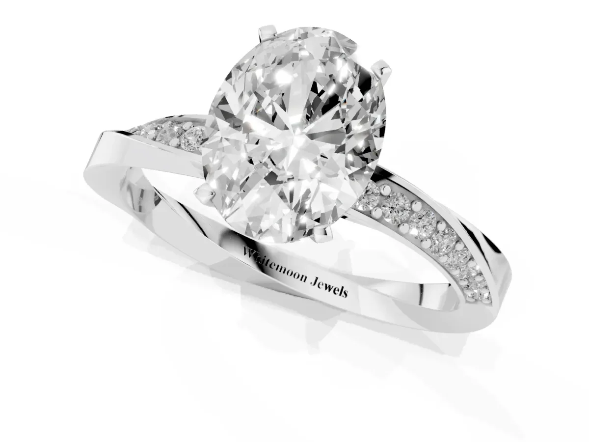 Oval Cut Diamond Engagement Ring with Side Stone Accents and Four-Prong Setting Silver