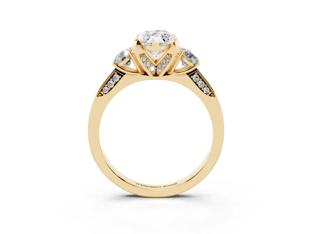 Marquise Cut Brilliant Three-Stone Diamond Ring with Pavé Band and Four-Prong Setting Yellow gold