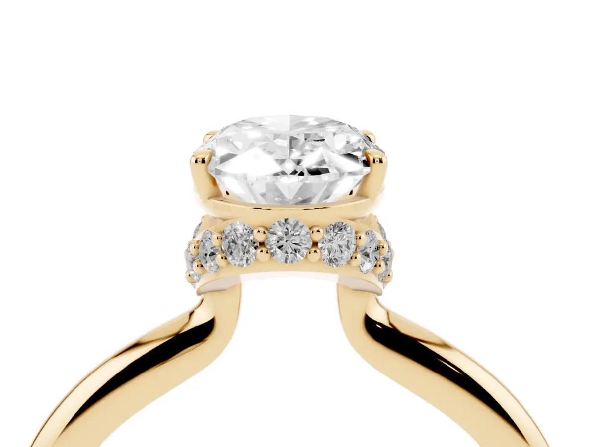 Oval Cut Brilliant Solitaire Engagement Ring with Six-Prong Setting and Classic Band Yellow gold