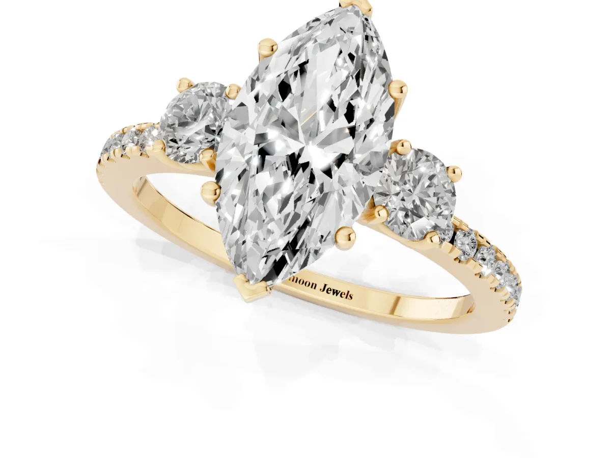Three-Stone Marquise Cut Cut Diamond Pavé Band with Prong Setting Yellow gold