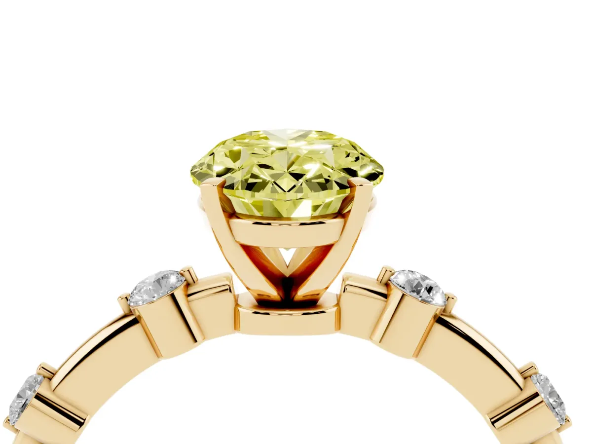 Fancy Yellow Oval Cut Solitaire Diamond Ring with Bezel Set Side Stones and Prong Setting Yellow gold