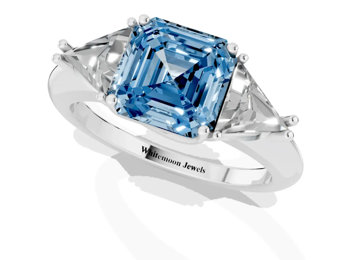 Fancy Blue Three-Stone Asscher Cut Diamond Engagement Ring with Trillion Side Stones and Prong Setting Silver
