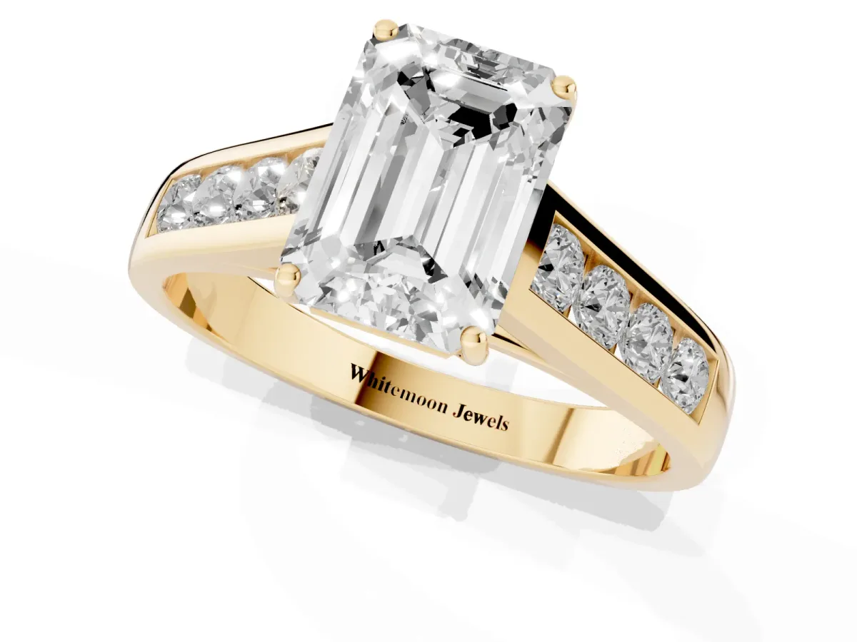 Emerald Cut Solitaire Channel-Set Diamond Engagement Ring with Four-Prong Setting Yellow gold