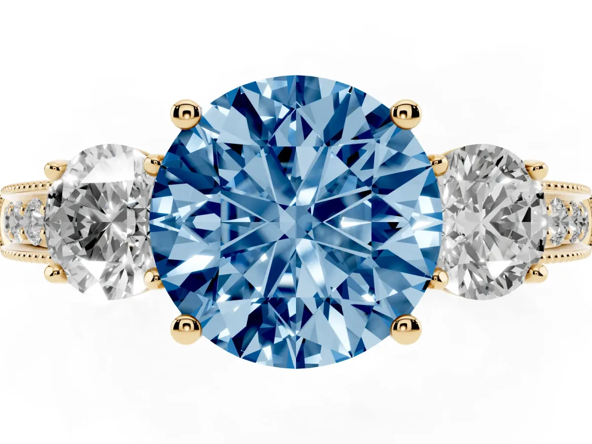 Fancy Blue Round Cut Three-Stone Diamond Ring with Pavé Band and Four-Prong Setting Yellow gold