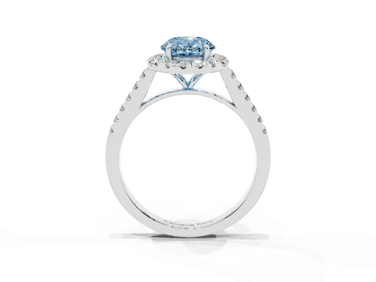 Fancy Blue Oval Cut Halo Pave Diamond Engagement Ring with Four-Prong Setting Silver