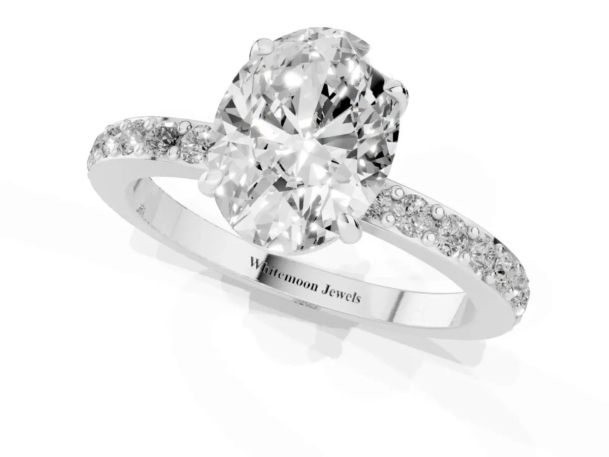 Oval Cut Diamond Pavé Engagement Ring with Round Accents and Prong Setting Silver