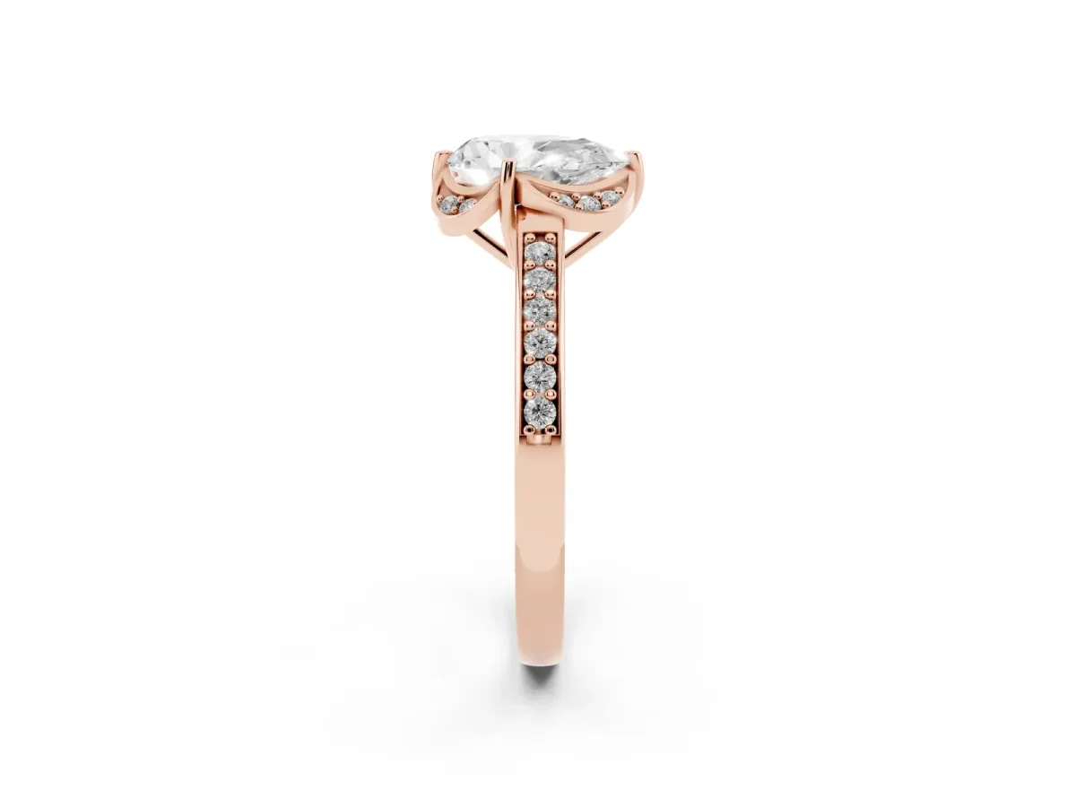 Pear Cut Cut Halo Diamond Ring with Channel Set Band and Four-Prong Setting Rose gold