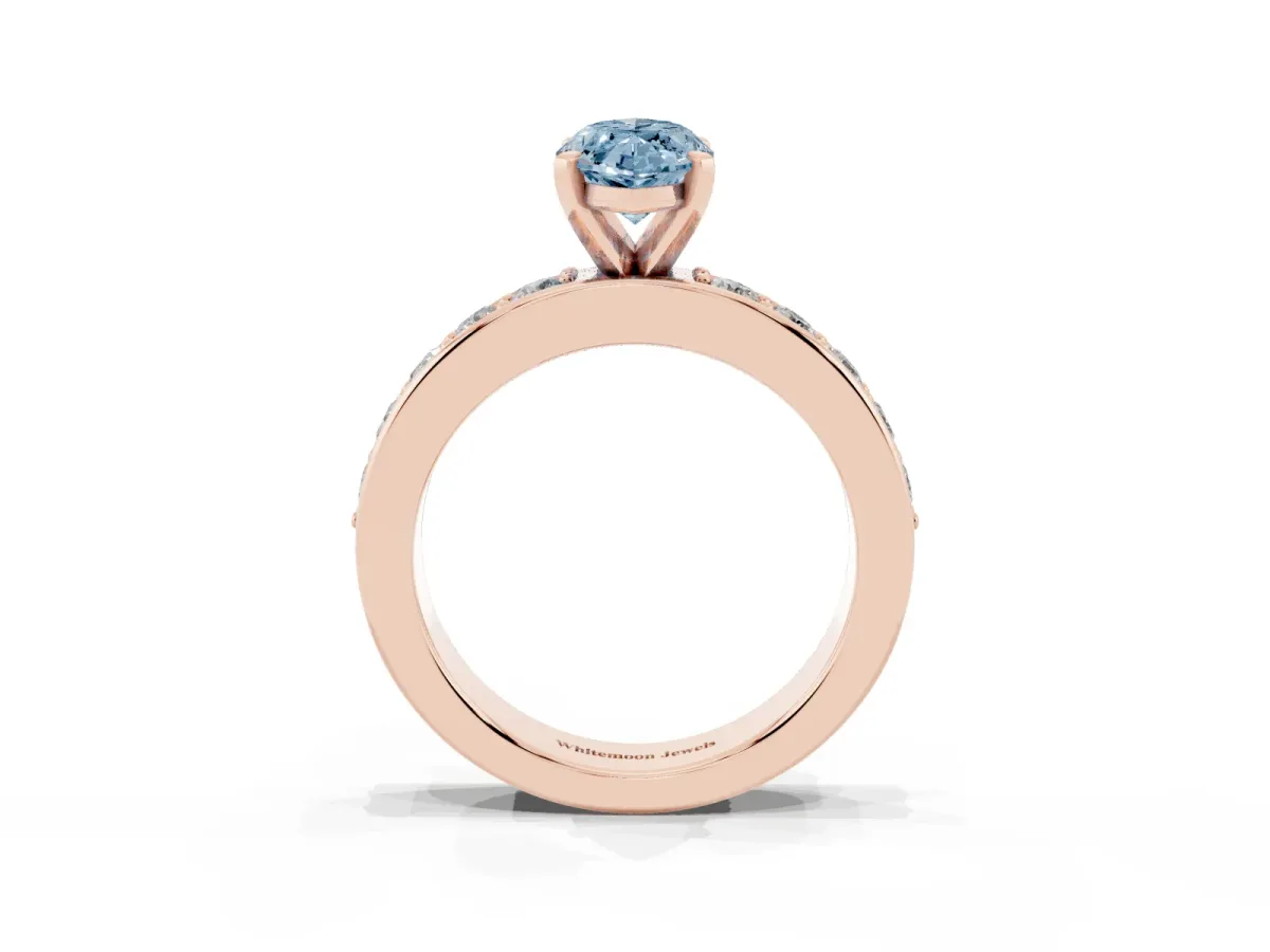 Fancy Blue Marquise Cut Diamond Engagement Ring with Channel Set Round Band and Prong Setting Rose gold