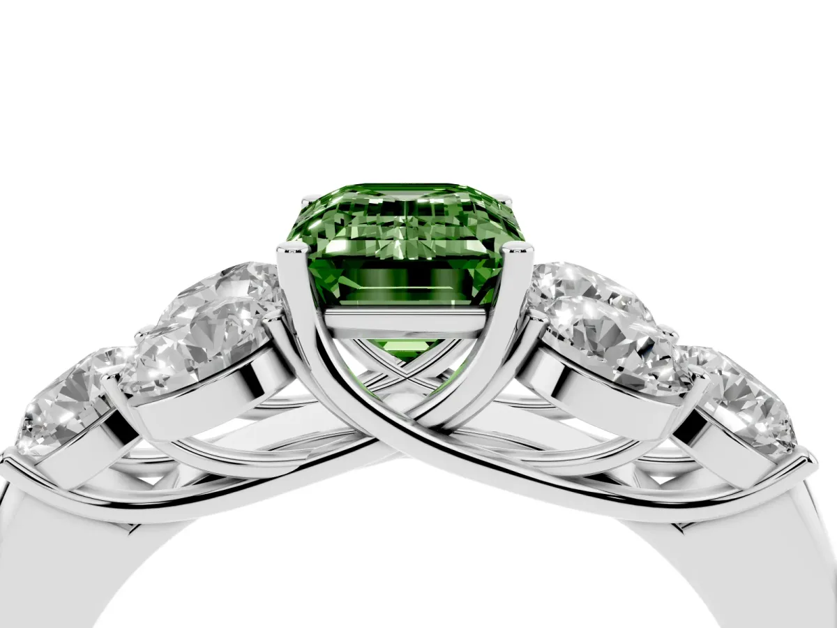 Fancy Green Emerald Cut Cut Diamond Cluster Ring with Round Accent Stones and Prong Setting on a Classic Band White gold