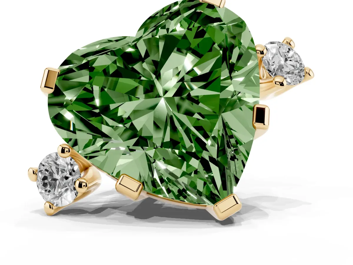 Fancy Green Heart Cut Cut Three-Stone Solitaire Ring with Round Accent Diamonds and Four-Prong Setting Yellow gold