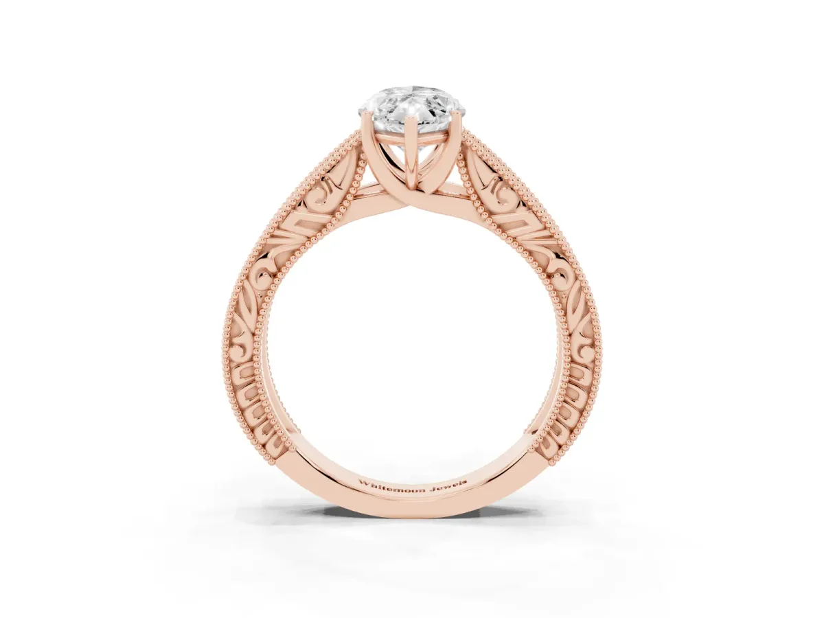 Marquise Cut Diamond Solitaire Ring with Engraved Band and Four-Prong Setting Rose gold