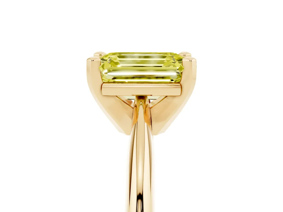 Fancy Yellow Emerald Cut Cut Solitaire Ring with Four-Prong Setting on a Classic Band Yellow gold