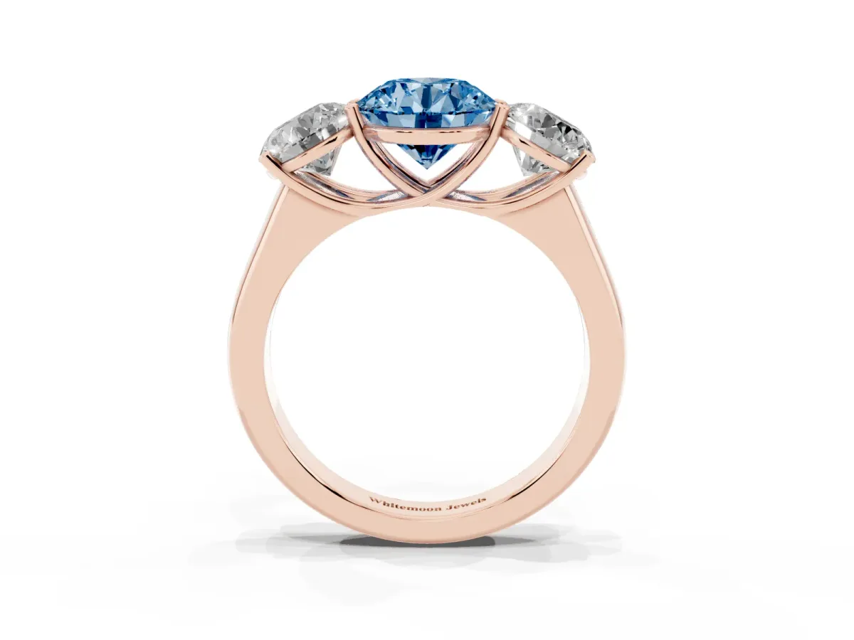 Fancy Blue Round Cut Three-Stone Diamond Ring with Prong Setting on a Classic Band Rose gold