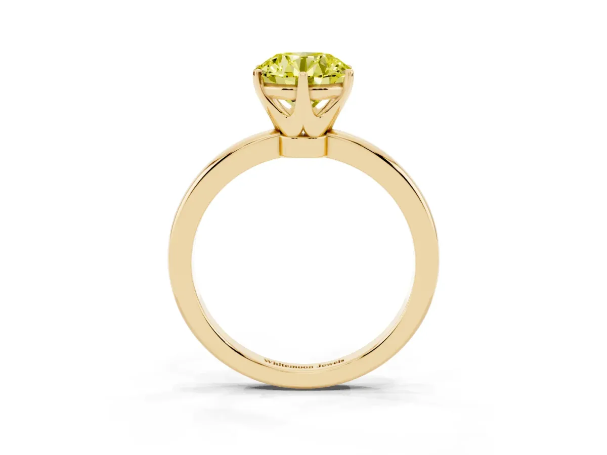 Fancy Yellow Round Cut Solitaire Diamond Ring with Six-Prong Setting on a Classic Band Yellow gold