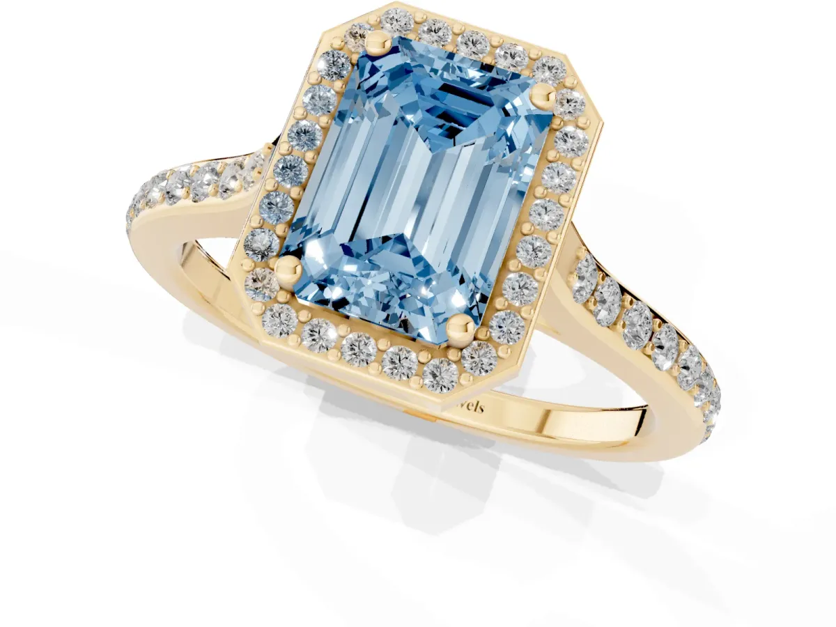 Fancy Blue Emerald Cut Diamond Halo Engagement Ring with Round Pavé Shoulders and Prong Setting Yellow gold