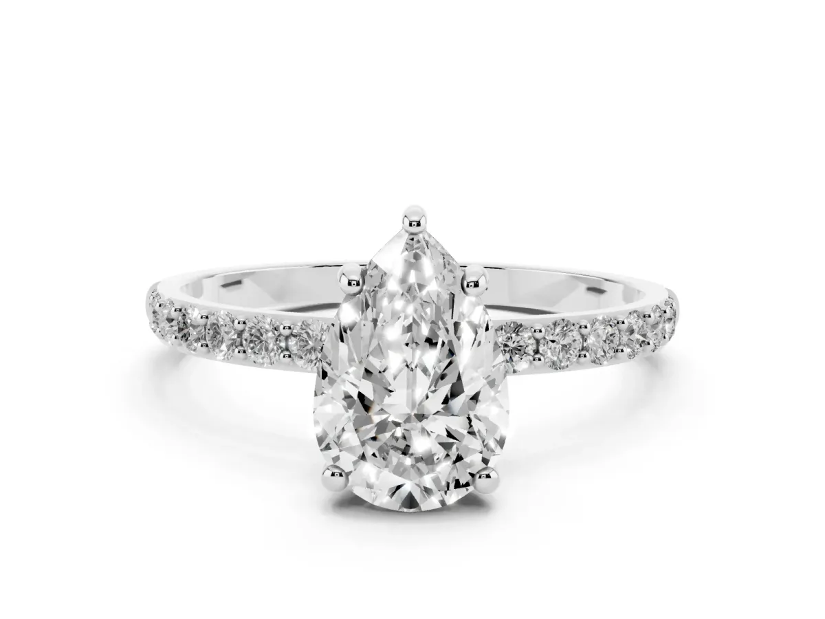 Pear Cut Diamond Solitaire Ring with Round Pavé Band and Prong Setting Silver