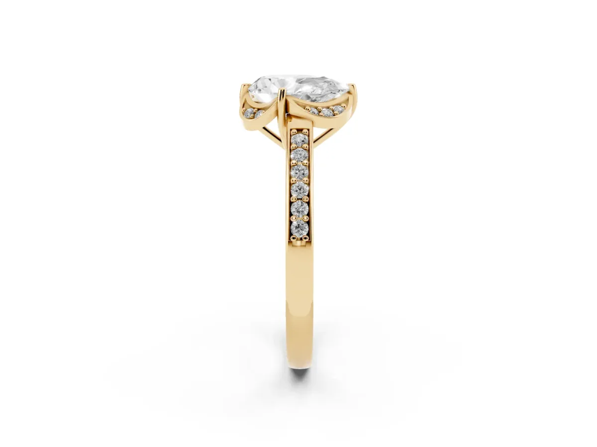Pear Cut Cut Halo Diamond Ring with Channel Set Band and Four-Prong Setting Yellow gold