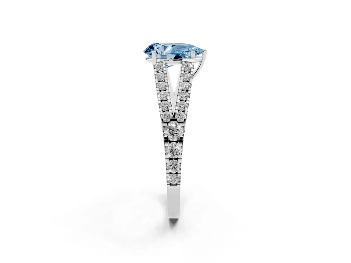 Fancy Blue Pear Cut Diamond Split Shank Engagement Ring with Round Pavé and Prong Setting Platinum