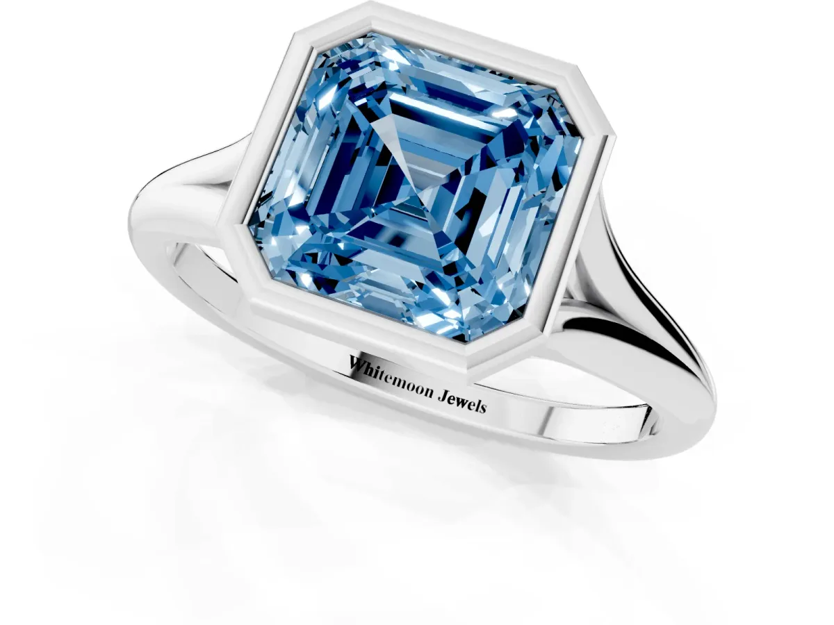 Fancy Blue Bezel Set Asscher Cut Cut Solitaire Ring with Tapered Band Silver
