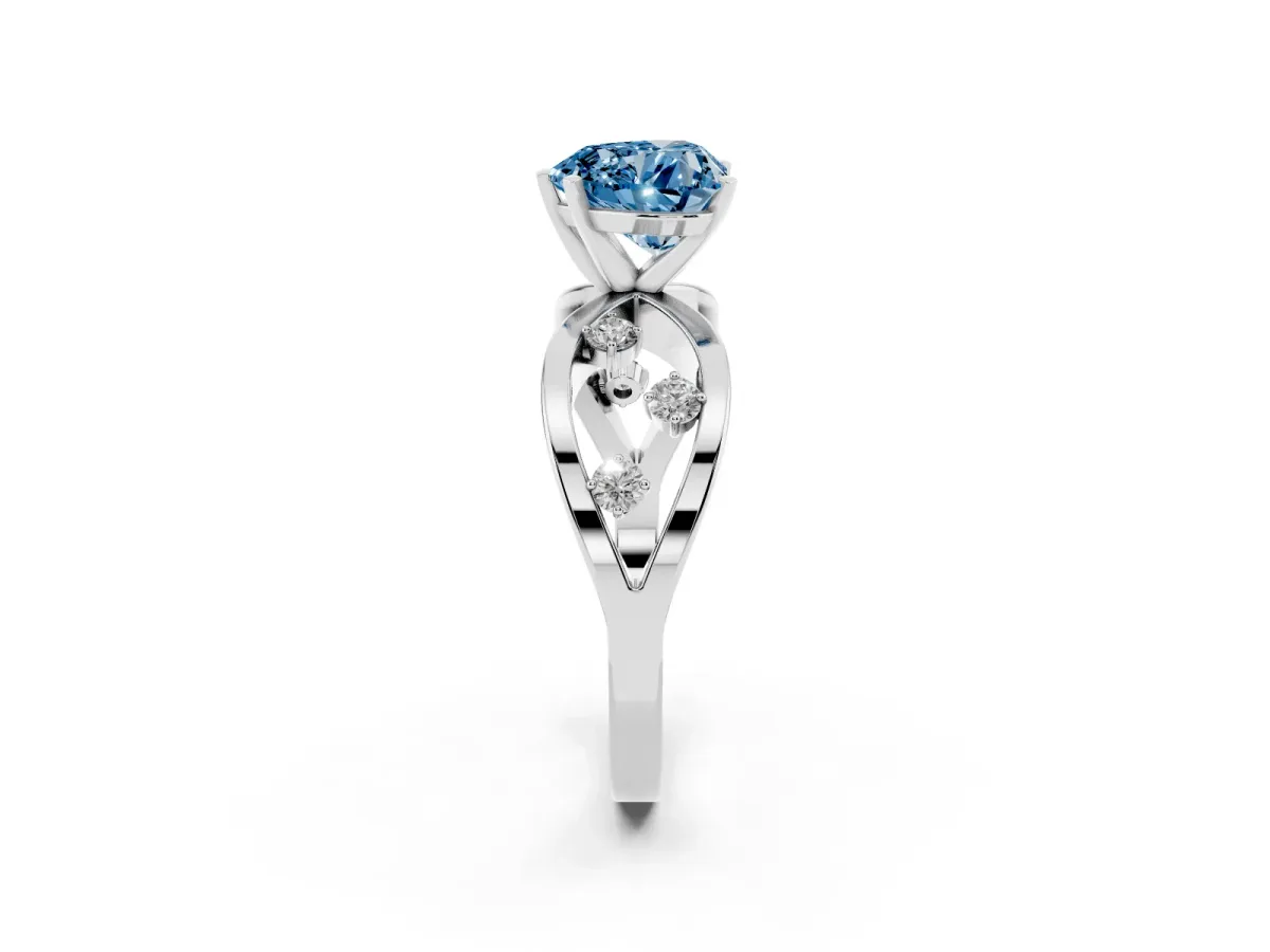 Fancy Blue Heart Cut Cut Solitaire Diamond with Side Stones on Criss-Cross Band and Four-Prong Setting Silver