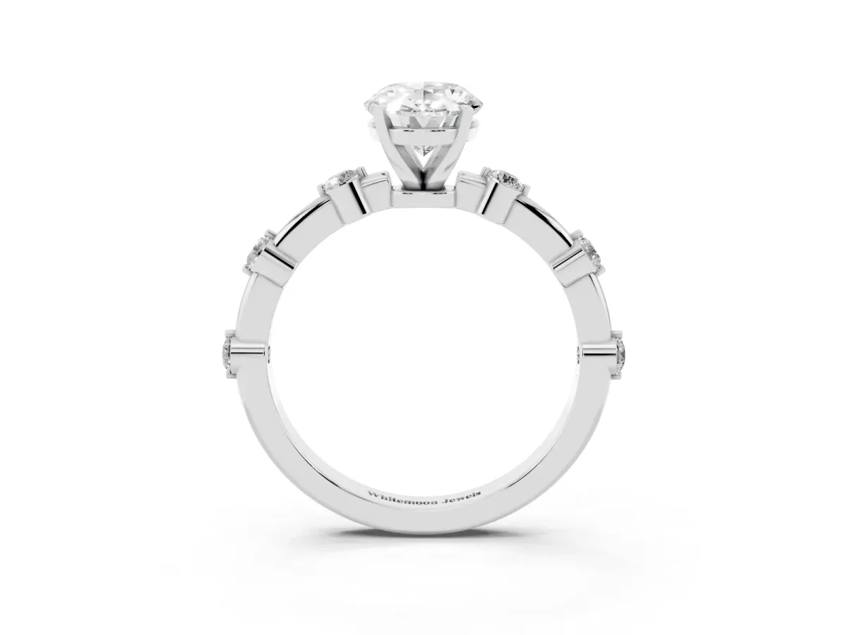 Oval Cut Solitaire Diamond Ring with Bezel Set Side Stones and Prong Setting Platinum
