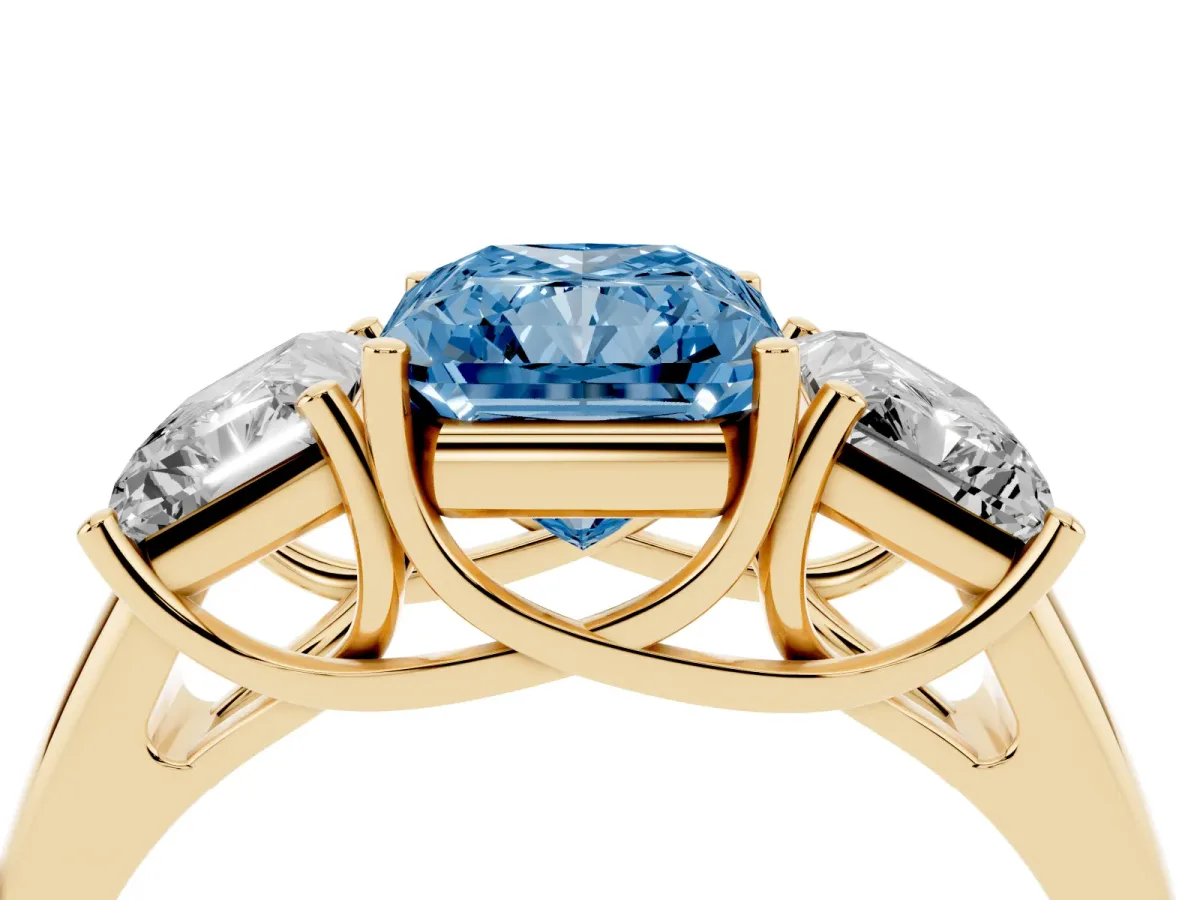 Fancy Blue Three-Stone Radiant Cut Diamond Engagement Ring with Prong Setting Yellow gold