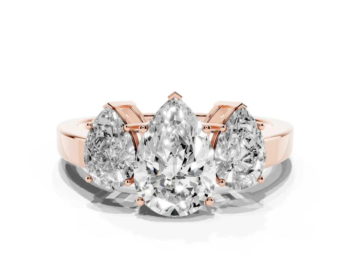 Three-Stone Pear Cut Cut Diamond Engagement Ring with Flat Band and Four-Prong Setting Rose gold