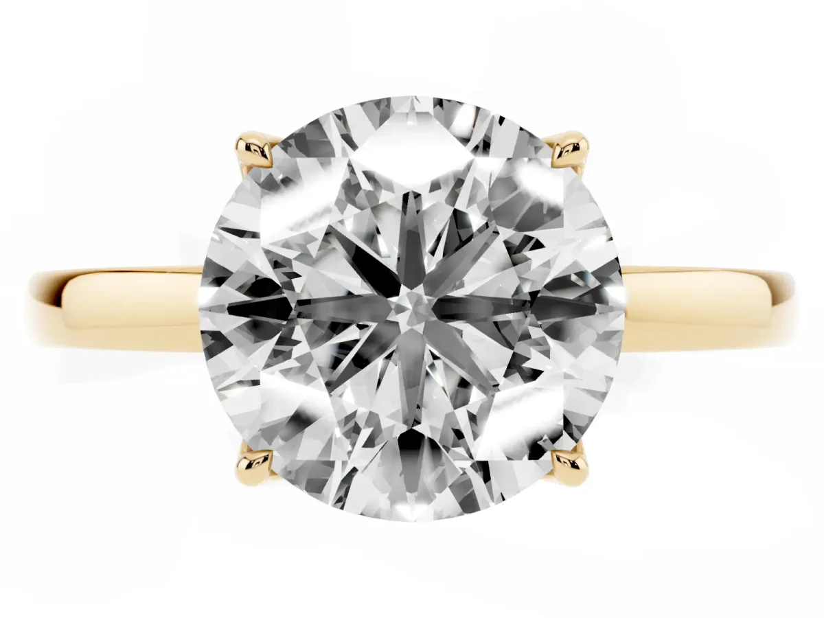 Round Cut Diamond Solitaire Ring with Thin Band and Prong Setting Yellow gold