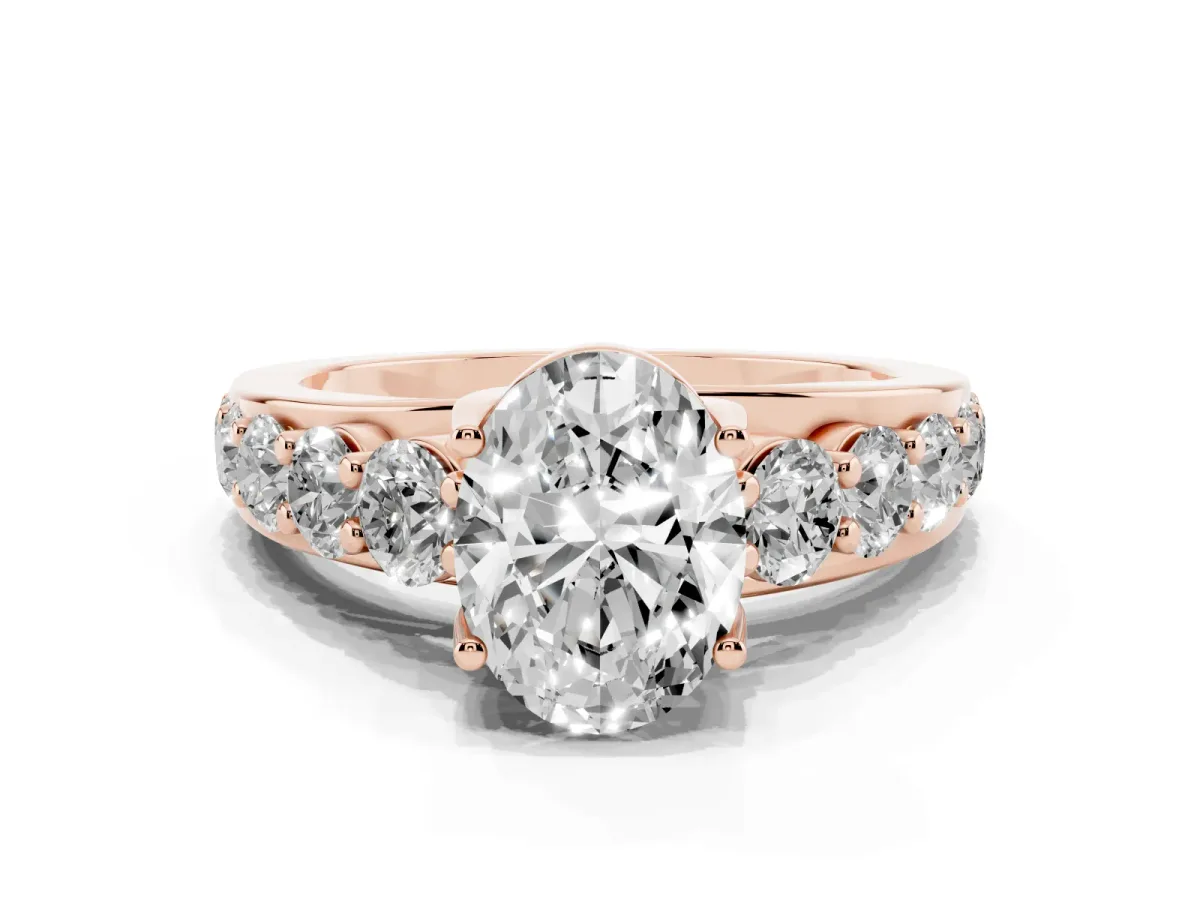 Oval Cut Diamond Engagement Ring with Pavé Band and Four-Prong Setting Rose gold