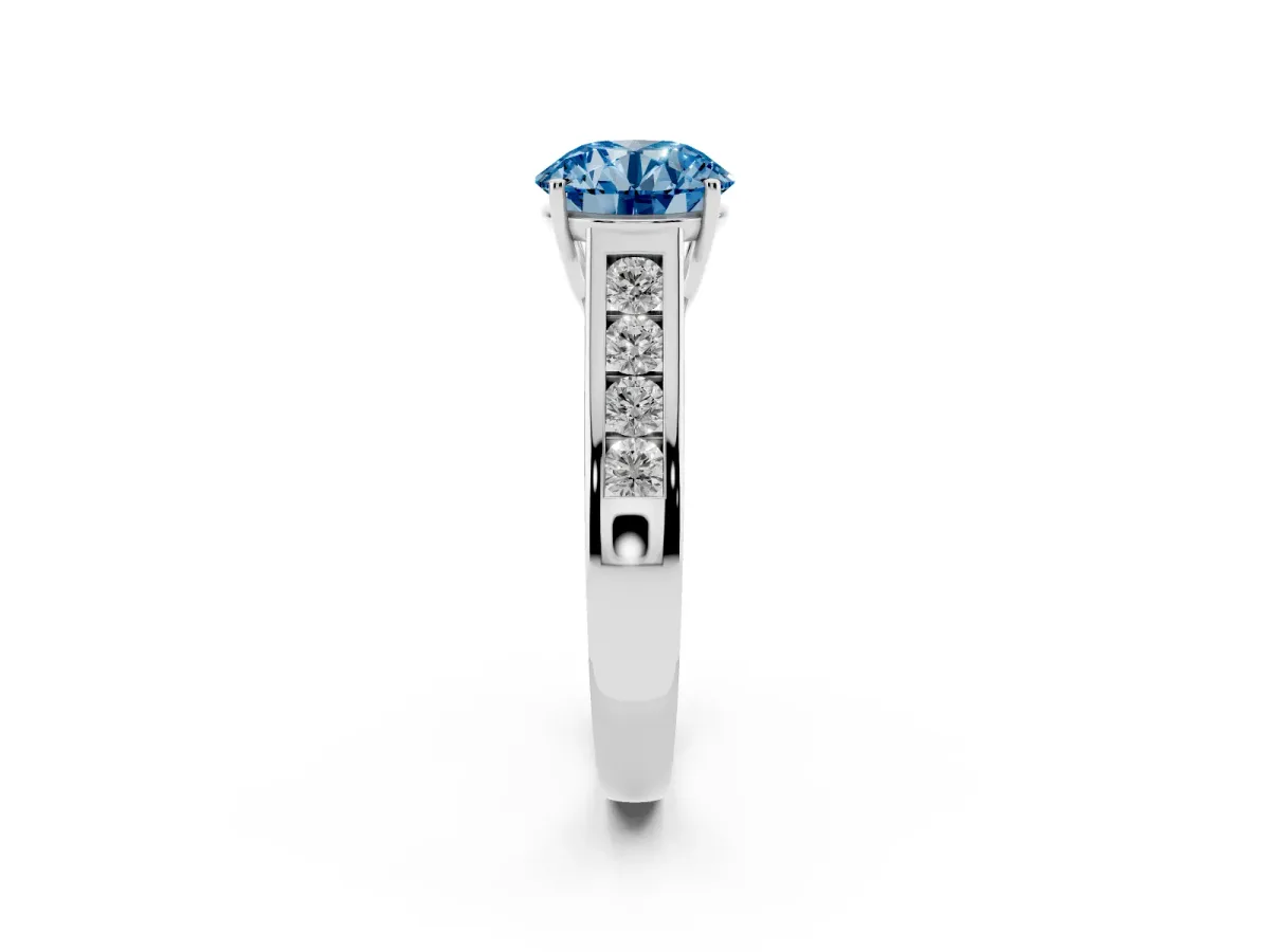 Fancy Blue Round Cut Solitaire Channel-Set Diamond Engagement Ring with Four-Prong Setting Silver