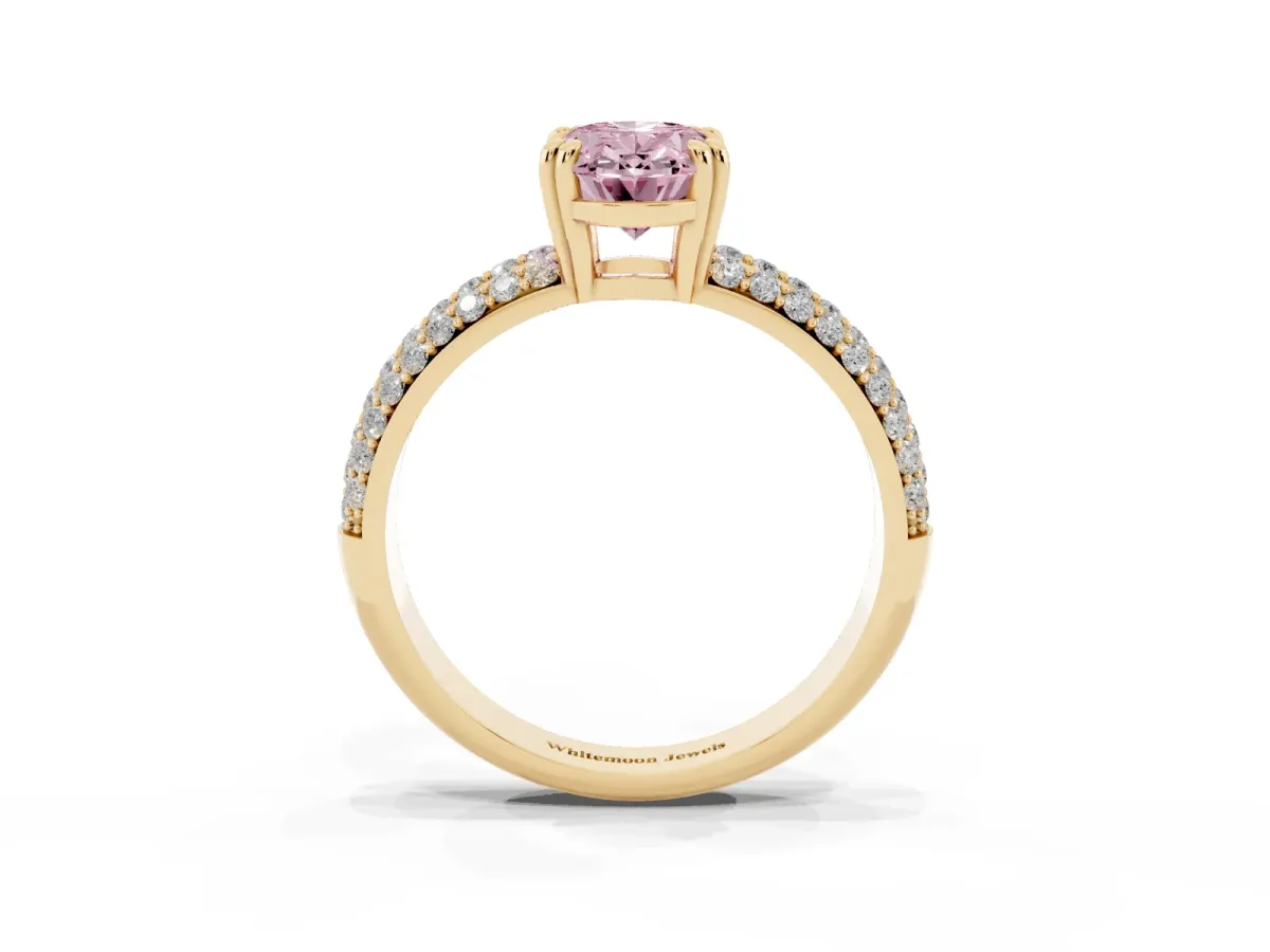 Fancy Pink Oval Cut Diamond Solitaire Ring with Multi-Row Round Pavé Band and Prong Setting Yellow gold
