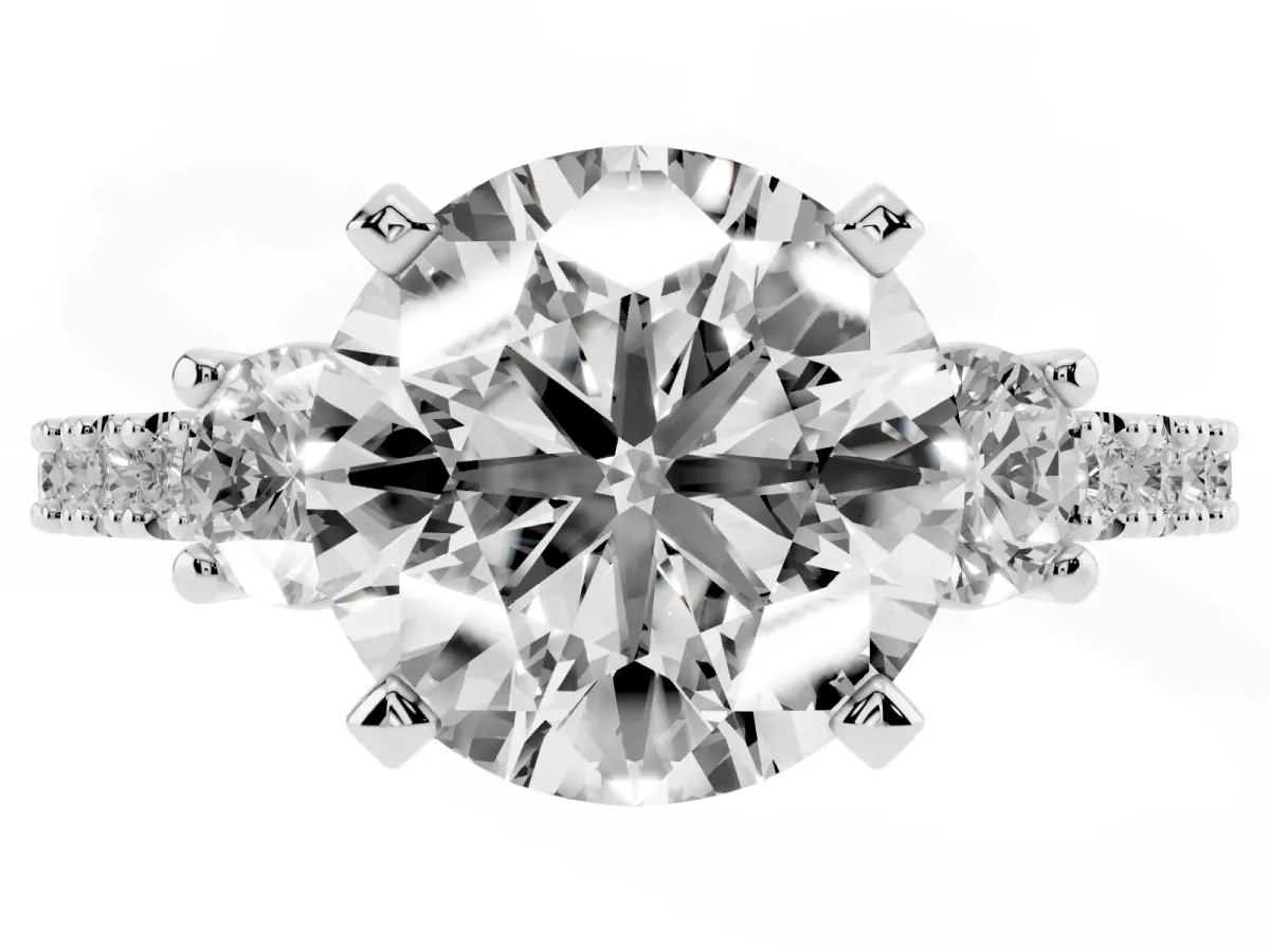 Round Cut Three-Stone Diamond Pavé Band with Prong Setting White gold