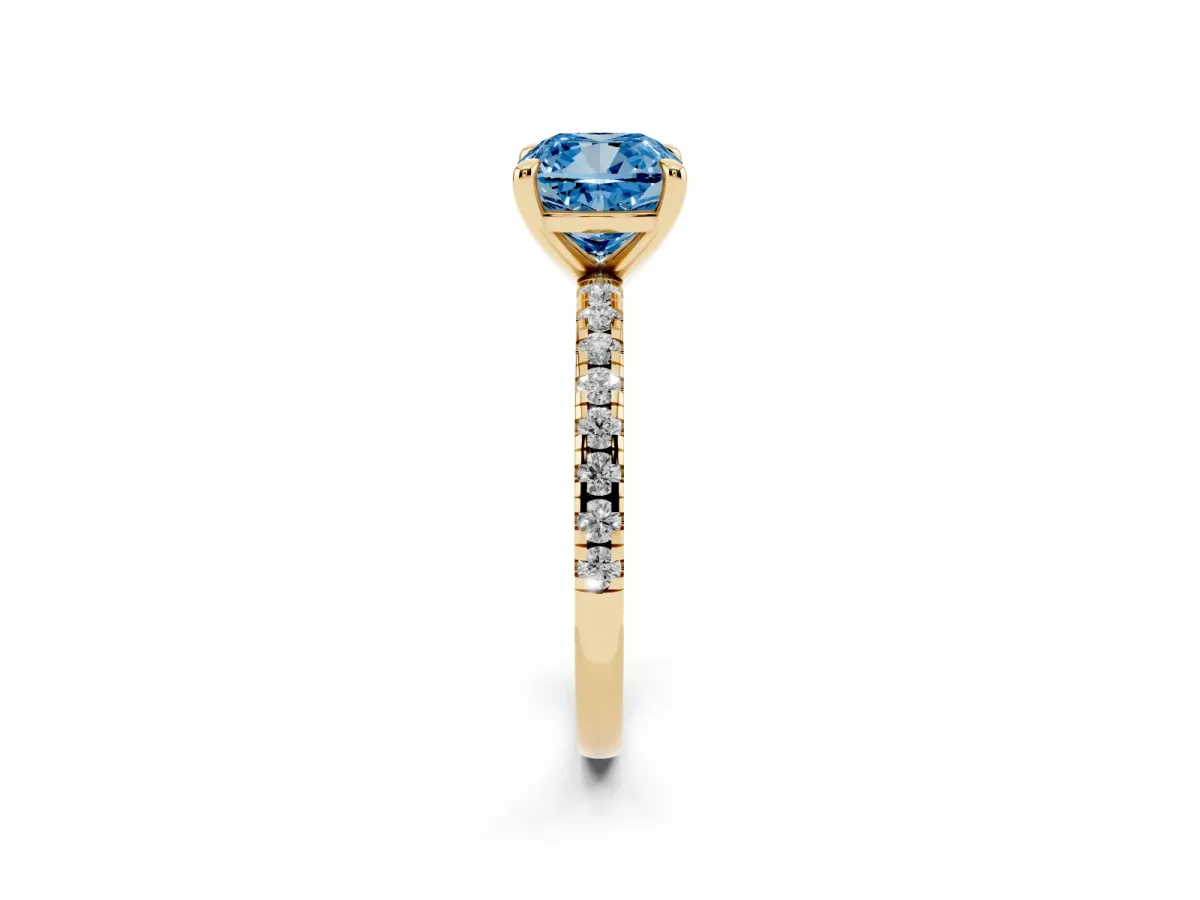 Fancy Blue Cushion Cut Diamond Brilliant Solitaire Ring with Pavé Band and Four-Prong Setting Yellow gold