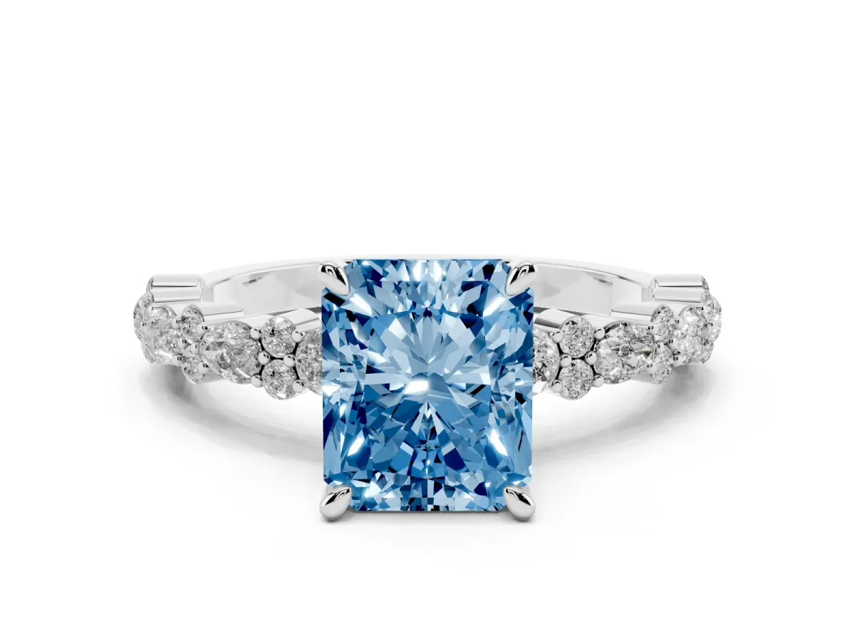 Fancy Blue Radiant Cut Diamond Side Stone Solitaire Ring with Round and Four-Prong Setting Platinum