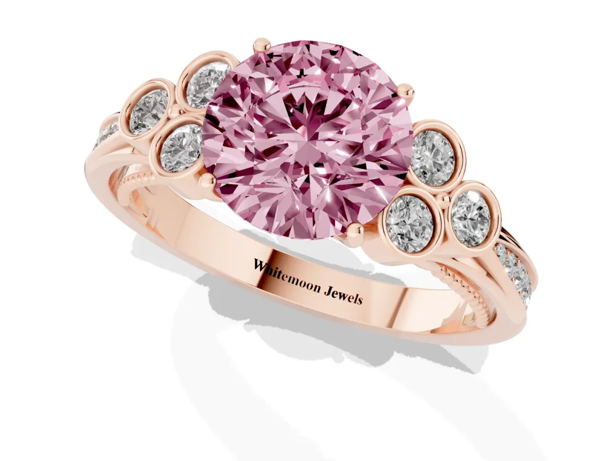 Fancy Pink Round Cut Cut Diamond Engagement Ring with Bezel Set Round Side Stones and Prong Setting Rose gold