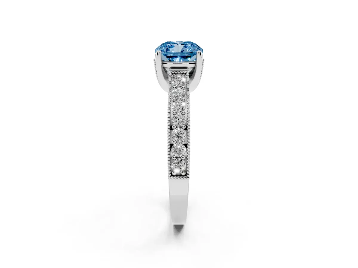 Fancy Blue Cushion Cut Cut Diamond Solitaire Ring with Milgrain Pave Band and Four Prong Setting Silver