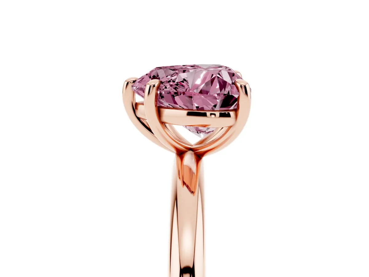 Fancy Pink Heart Cut Solitaire Diamond Ring with Four-Prong Setting on a Plain Band Rose gold