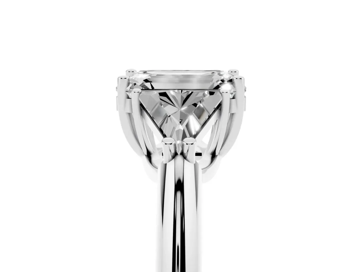 Three-Stone Emerald Cut Diamond Engagement Ring with Trillion Side Stones and Prong Setting Silver