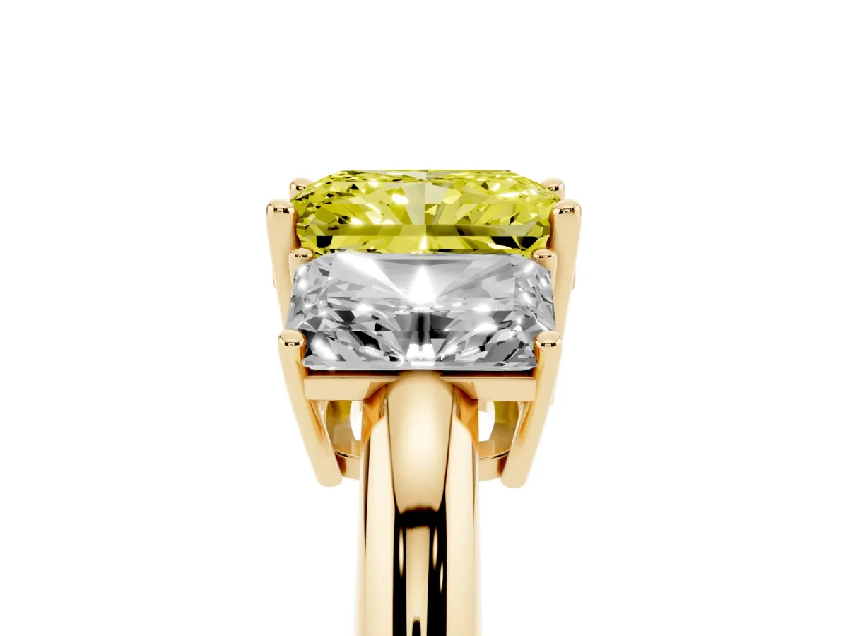 Fancy Yellow Three-Stone Radiant Cut Cut Diamond Engagement Ring with Prong Setting on a White Gold Band Yellow gold