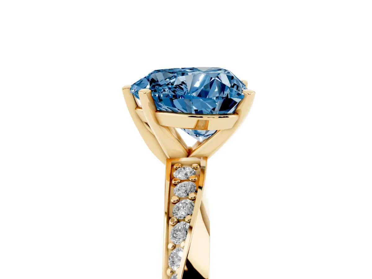 Fancy Blue Heart Cut Diamond Engagement Ring with Side Stone Accents and Four-Prong Setting Yellow gold