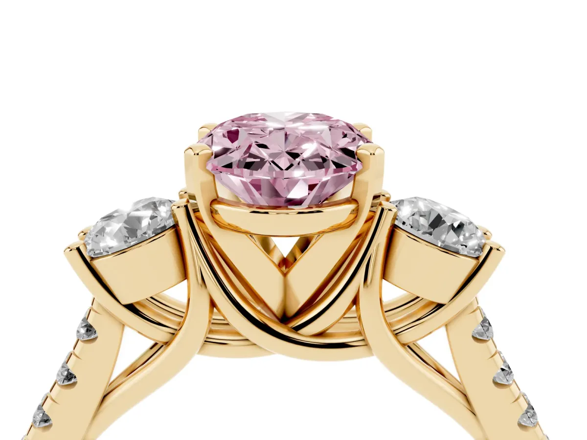 Fancy Pink Three-Stone Oval Cut Diamond Pavé Band with Four-Prong Setting Yellow gold