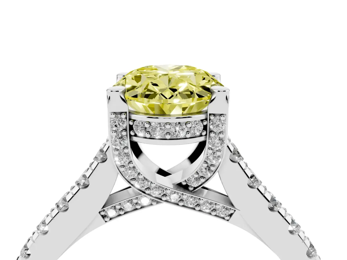 Fancy Yellow Oval Cut Brilliant Diamond Solitaire with Pavé Band and Four-Prong Setting Silver