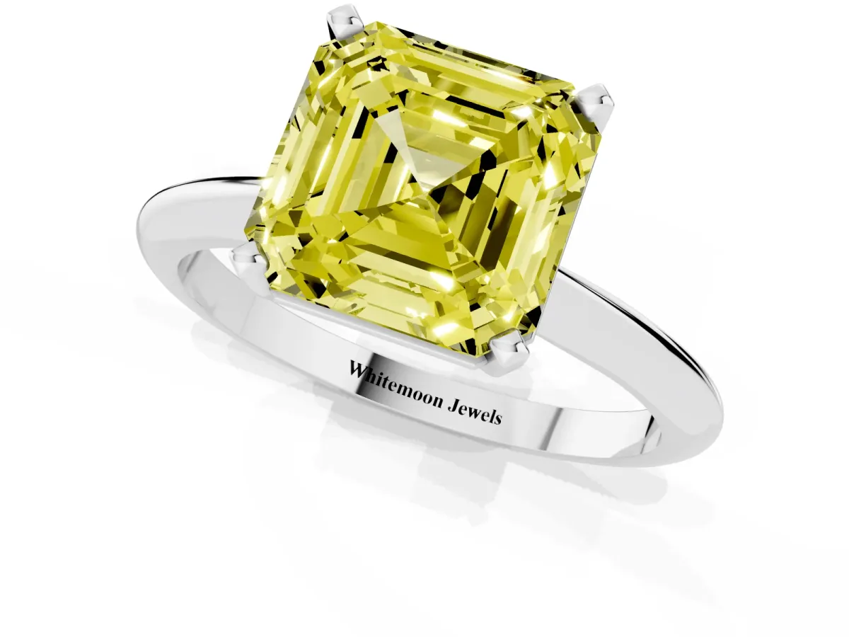 Fancy Yellow Asscher Cut Cut Solitaire Ring with Four-Prong Setting on a Classic Band Silver