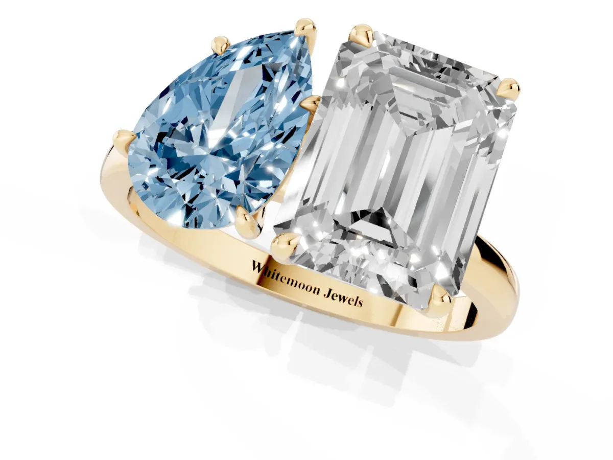 Fancy Blue Pear Cut and Emerald Cut Toi Moi Ring with Prong Setting Yellow gold