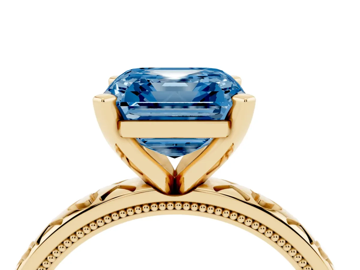 Fancy Blue Asscher Cut Solitaire Diamond Engagement Ring with XO Engraved Band and Four-Prong Setting Yellow gold