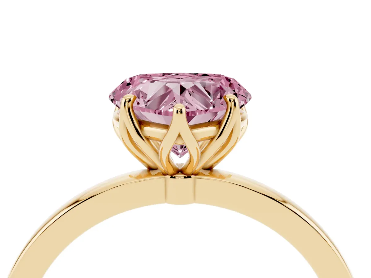 Fancy Pink Heart Cut Diamond Solitaire Ring with Thin Band and Prong Setting Yellow gold